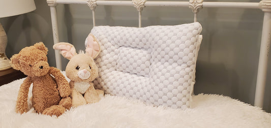 Lussi & Company Toddler Pillow On Bed With Stuffed Animals